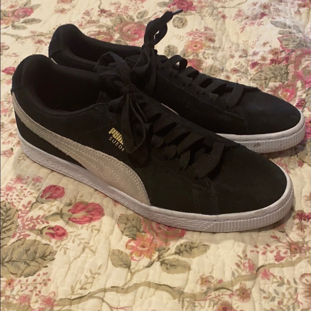 Women’s black suede puma sneakers